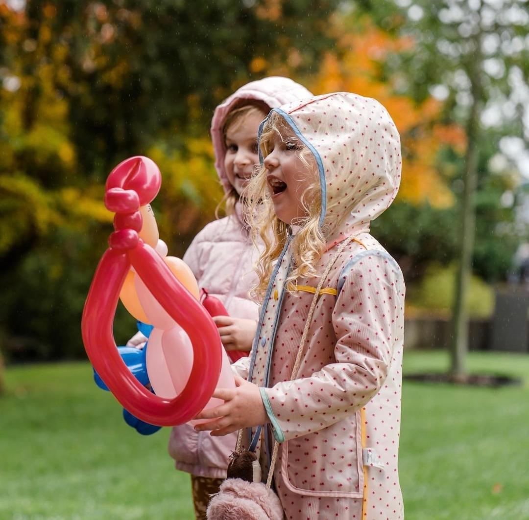 Happy children celebrating at a balloon party with Balloonatic Bruce