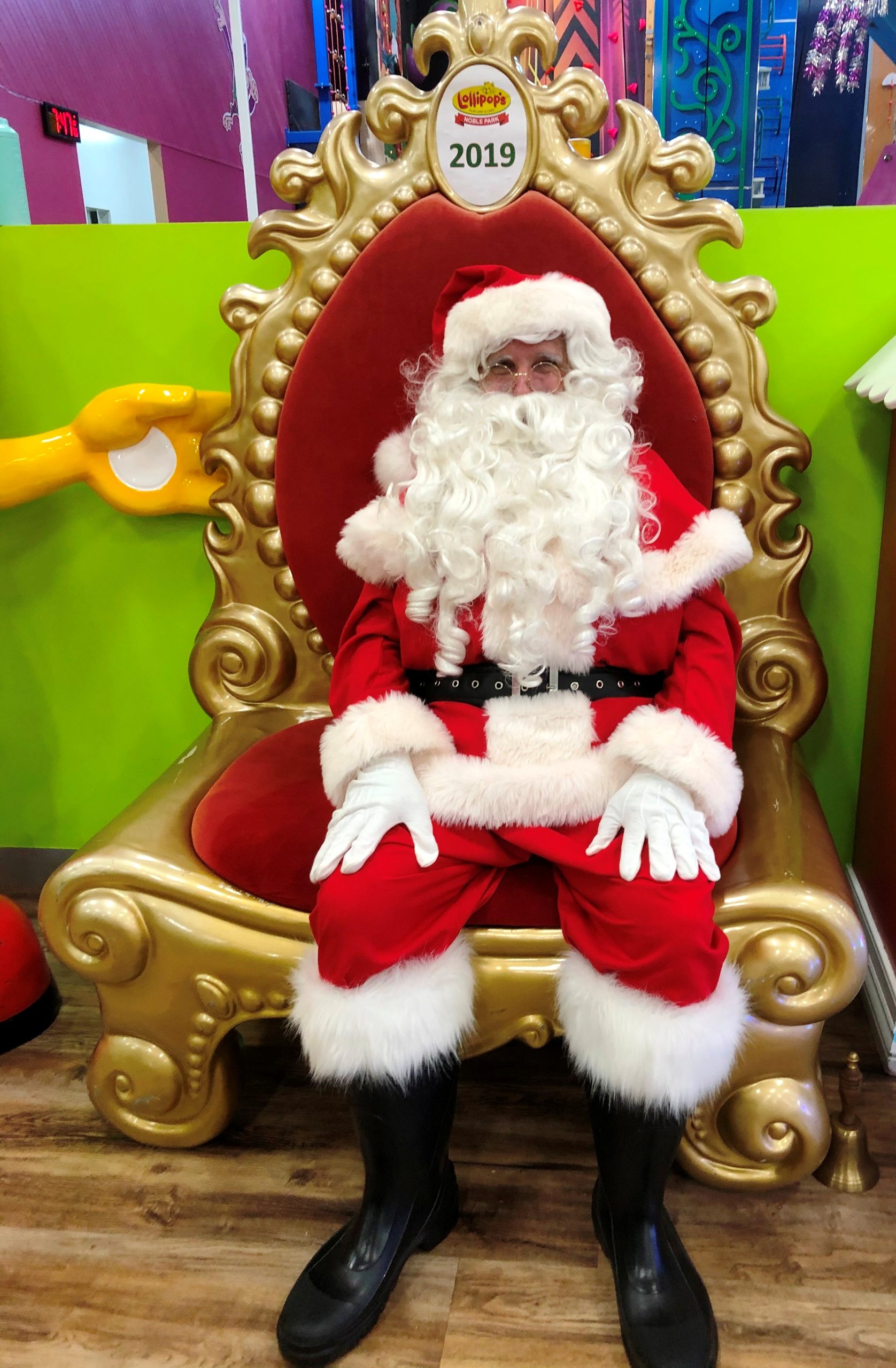 Real Santa Claus in gold throne